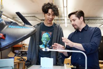 Student working with clay making ceramics