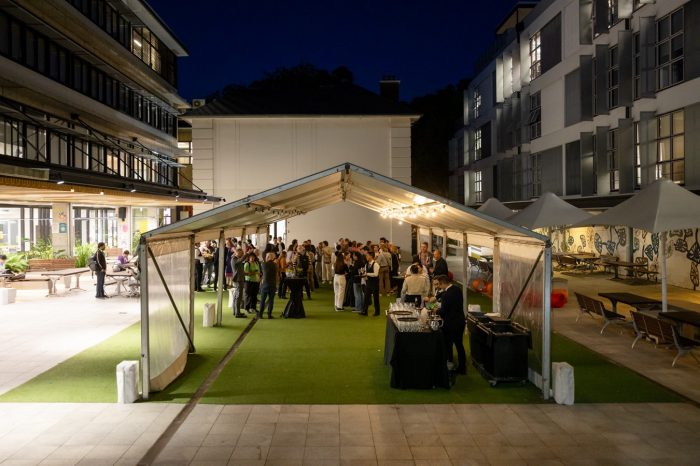 Guests networking and enjoying drinks after the November 2023 Creative Conversations  discussion panel on Ai