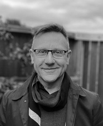 Headshot of Lawrence Harvey