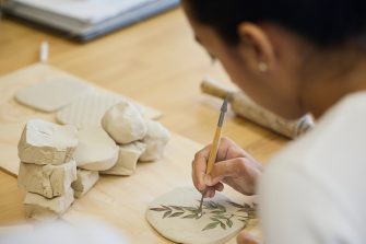 UNSW ADA students participating in a ceramics workshop.
