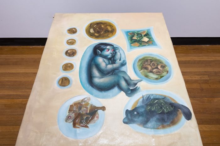 Lok Yin Law, ‘Dinner, in the making’ 2025. Oil on canvas; On table: ‘Just a family reunion’, 134 x 105cm; Wall works: ‘外嫁女 (Married Daughter)’, 40 x 50cm, ‘Wet paint’, 40 x 50cm. 