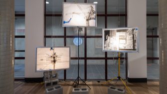Eric Kang, ‘Leviathan’ (2025). Traditional Korean ink on tracing paper with aluminium frames, wire rope assembly, tape, work lights and concrete blocks; 3 panels: 60cm x 85cm each. Photograph: Anna Kucera.