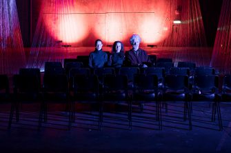 SAM Alumni sitting in theatre