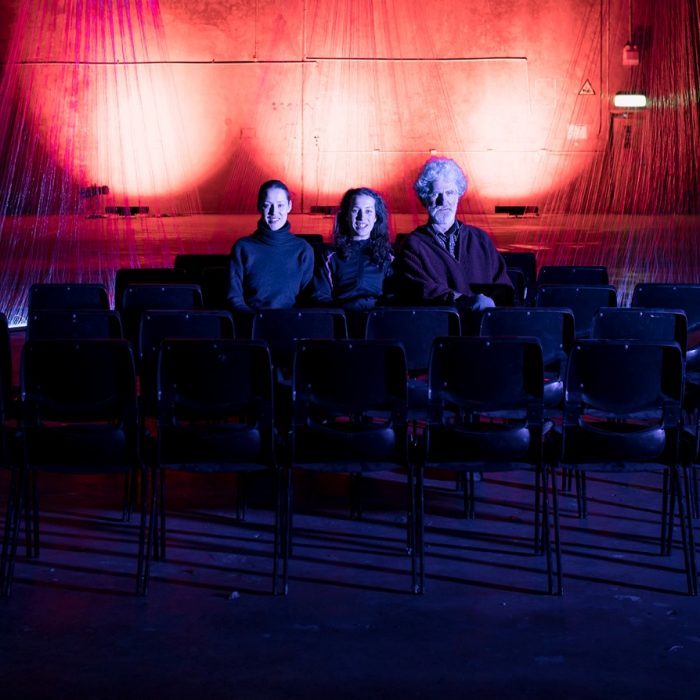 SAM Alumni sitting in theatre