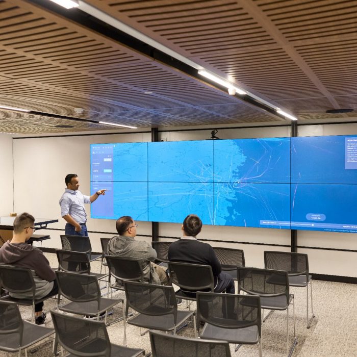 Students using technology in the City Futures Lab at the School of Built Environment