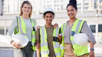Architecture, women construction team and diversity in portrait, contractor group with smile at building site. Architect, engineering female with solidarity and trust in collaboration with builder.