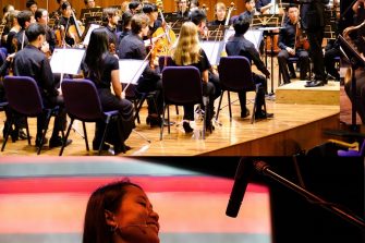 Music orchestra and music student playing handbells