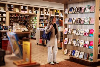 Student browsing books at the UNSW Bookstore