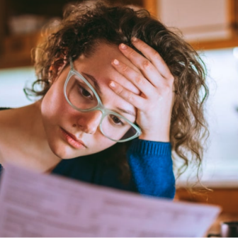 Woman paying mortgage
