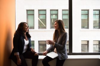 Two women chatting