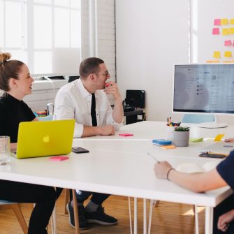 People discussing around a table