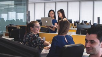Two women having a discussion in the office