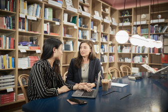 Business student mentoring meeting at UNSW Bookshop