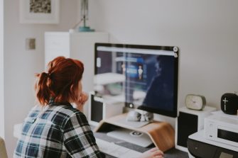 Women sitting in front of a computer