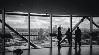 Meeting near a transparent glass