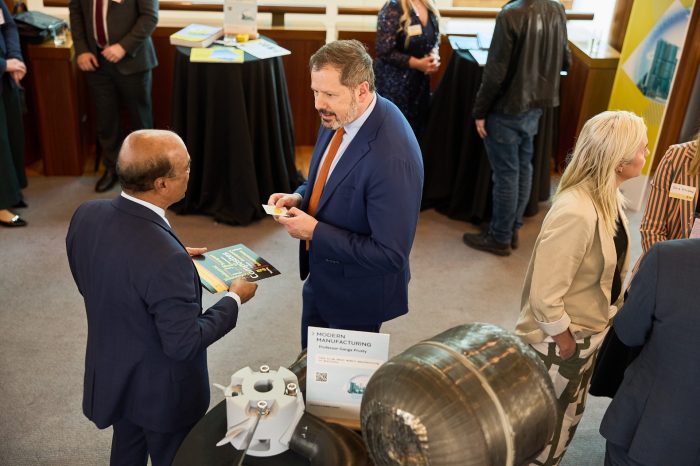 Professor Gangadhara Prusty speaking to Labor backbencher Ed Husic.
