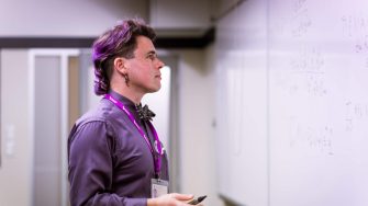 A person standing at whiteboard