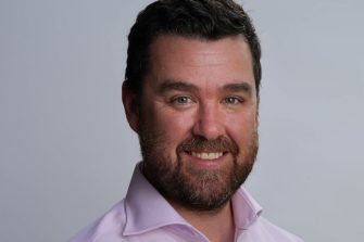 Headshot image of Kyle Mackey-Laws