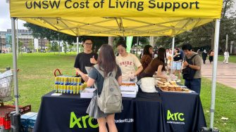 UNSW students enjoying free food at Arc Savers stalls