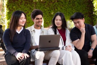 Group of students hanging out on university campus