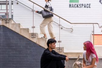 Students chatting outdoors on Paddington Campus