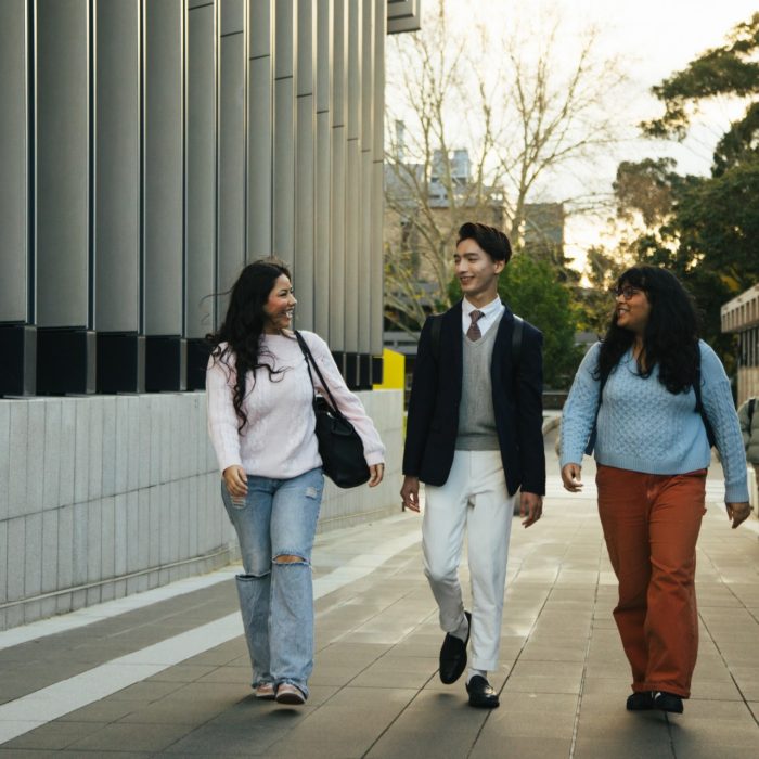 Students walking by the Science & Engineering Building