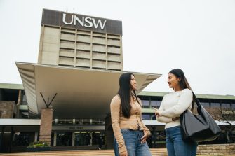 Students chatting on library lawn