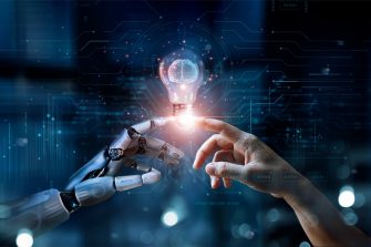 AI, Machine learning, Hands of robot and human touch on big data network, Brain data creative in light bulb, Science and artificial intelligence technology, innovation for futuristic.