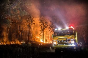 Firetruck beside a bushfire