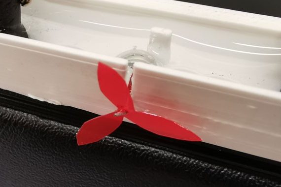 Liquid metal droplet rotary paddle motor