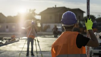 Surveyors in hard hats
