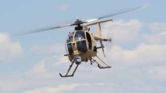 Boeing ULB helicopter flying in the sky