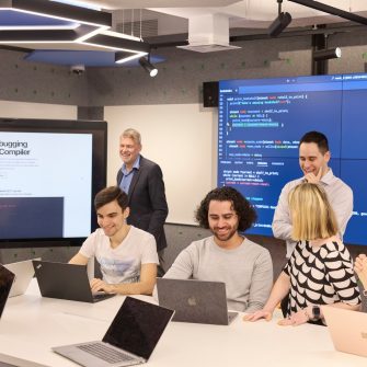 5 people in a corporate meeting