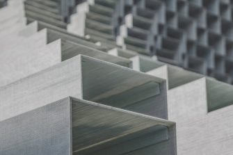 structural steel bars stacked ontop of each other