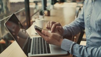 social media, closeup of hands holding smartphone in cafe, banking online, businessman with mobile internet