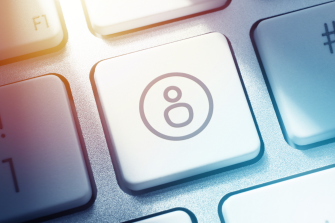 Close-up of at key on computer keyboard