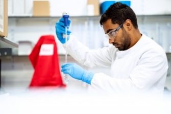 Biomedical engineer in lab