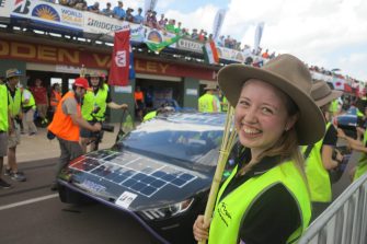 Students at a car demonstration event