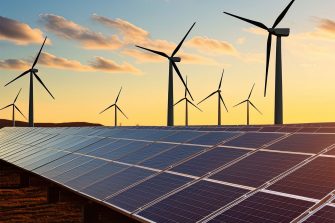AI generated image of solar panels and wind turbines against a backdrop of a blue sky and clouds