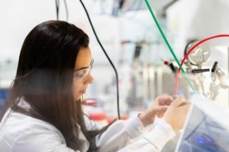Female engineer in lab with wiring