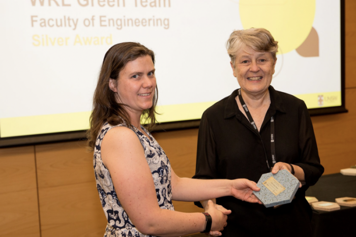 Kristina Palmer accepting the Silver Award for the WRL Green Team