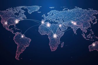 Interconnected glowing dots forming a world map representing global business alliances and strategic partnerships