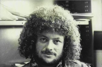 Young David Brown reading a book