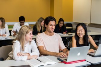 Students learning and participating in a class