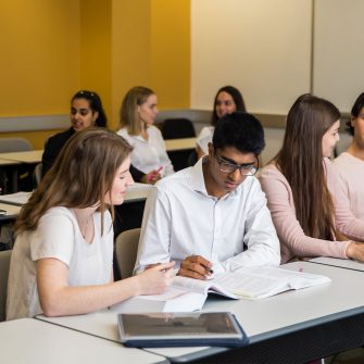 Students learning and participating in a class
