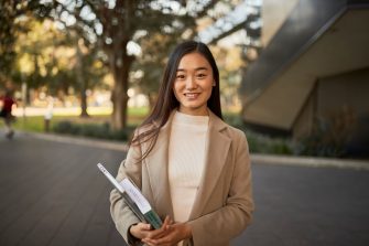 Law student portrait outside, in front of Law Building