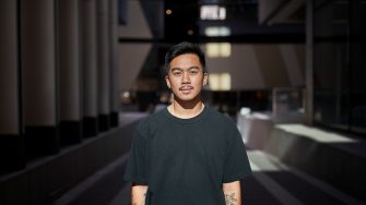 Law student portrait with building exterior and building shadows