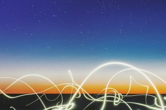 Graphic lines against night sky illustration