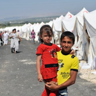 TURKISH-SYRIAN BORDER -JUNE 18, 2011: unidentified Syrian people in refugee camp in Turkey on June 18, 2011 on the Turkish - Syrian border.
