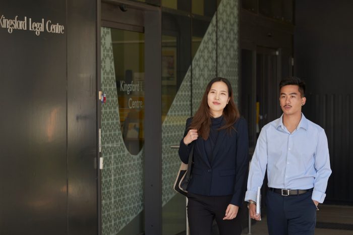 Two Law students in front of Kingsford Legal Centre